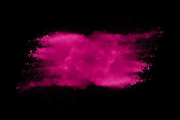 Explosion of pink dust on black background. - 276365251