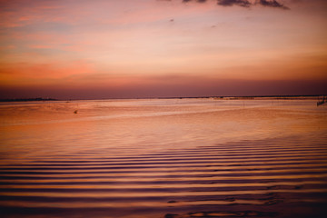 Evening sea, golden yellow light