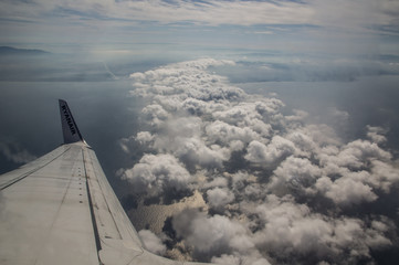 Fototapeta na wymiar Clouds Airplane Wing