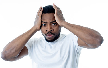 Close up portrait of concern scared shocked adult man with a terrified facial expression