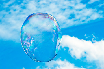A large bubble floats in the sky