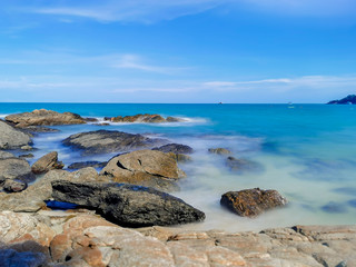Rocks on the beach, Landscape with blue sea and Blue sky