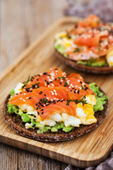 Smoked salmon, scrambled eggs and avocado  rye crisp toast