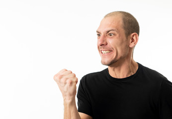 Facial expressions and emotions. Portrait of young man with crazy happy face celebrating victory