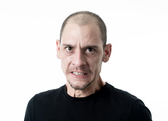 Fototapeta premium Mad and aggressive guy in facial expressions and negative human emotions