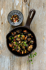 Roasted mushrooms in pan