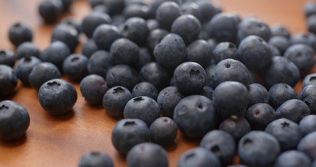 Stack of blueberry on wooden plate