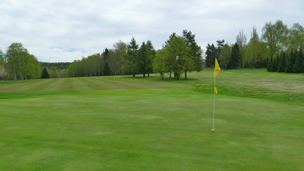 Golf course Karlovy Vary: Green with flag on hole number five, Czech Republic