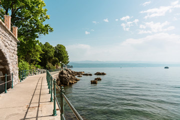 Fototapeta na wymiar Boulevard along the Adriatic Sea, between Icici and Lovran, Croatia