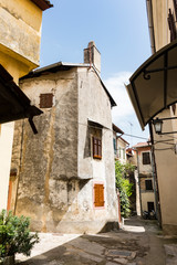 old house in small street in Lovran, Croatia