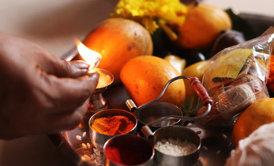 Lighting up Flame of Indian Traditional Holy Dish