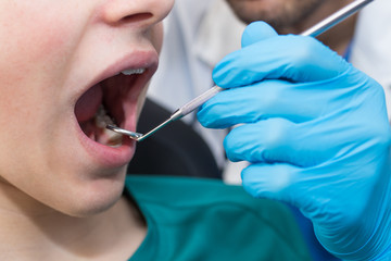 dentist with the patient checking the dentures