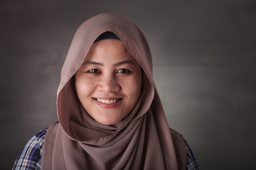 Portrait of Asian Muslim Lady Smiling