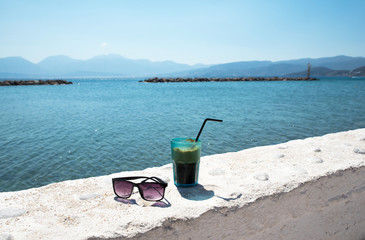 Refreshing drink on a hot day at the beach