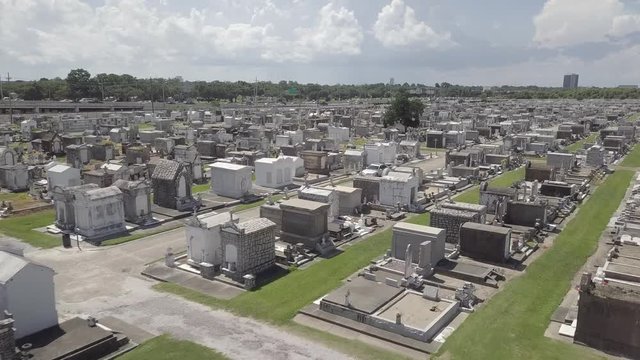 Tombstones and crypts at Nola cemetery aerial in New Orleans