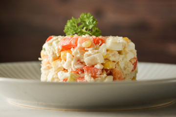 Chicken meat salad with mayonnaise and vegetables.