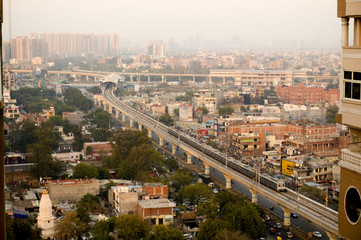 Fototapeta premium Aerial cityscape shot of Noida, delhi, grugaon at dusk night