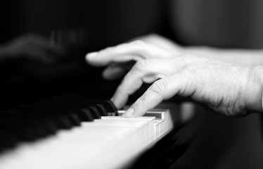 Fototapeta premium Man playing the piano