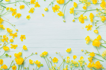 summer flowers on green wooden background
