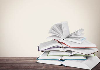 Old books in row on dark  background