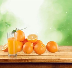 Orange juice and slices of orange on background © BillionPhotos.com