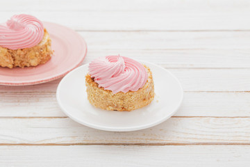 cakes on  white wooden background