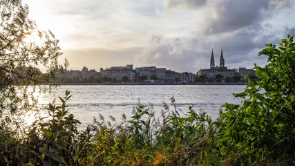Fotobehang Panorama of Bordeaux and Garonne river © Willy Mobilo