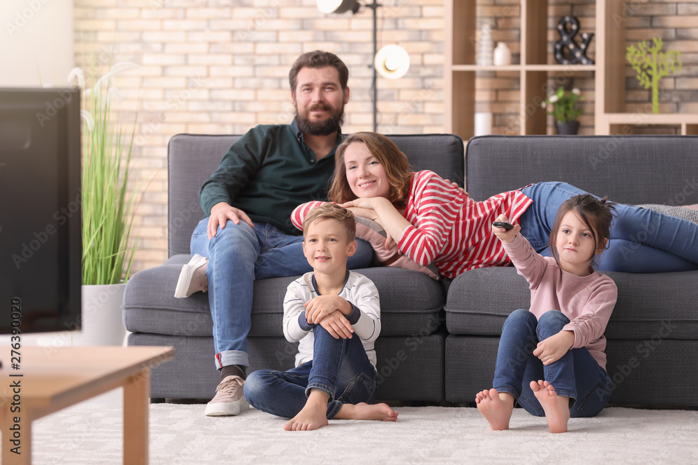 Canvas Prints Happy family watching TV at home