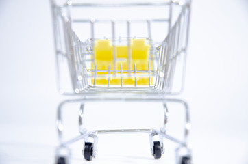 Yellow cart isolated with white.Copy space.