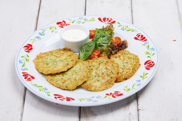 potato pancakes with sour cream