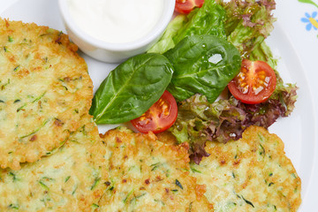 potato pancakes with sour cream