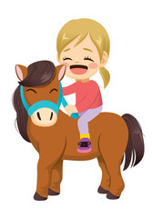 Lovely little smiling girl riding pet horse