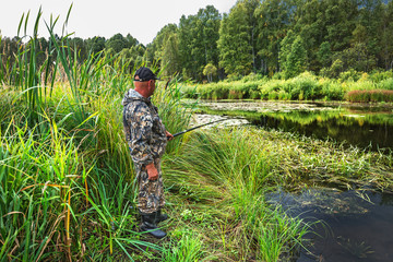 Fisherman on the river. Western Siberia