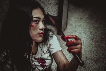 Beautiful asian woman,Murder crime concept,Blood on the body,Horror scene