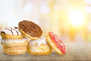 Delicious glazed doughnuts isolated on white background