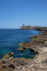 Fototapeta na wymiar Beautiful view of the Lighthouse in the Old Havana City, Capital of Cuba, during a vibrant sunny day.