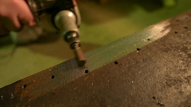 deburring a metal part