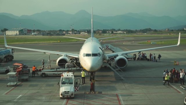 Airplane bording passengers before departure