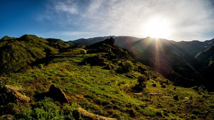 Fototapeta premium A Stunning sunrise in the mountains. Beautiful spring landscape. Zangezur Mountains. Armenia