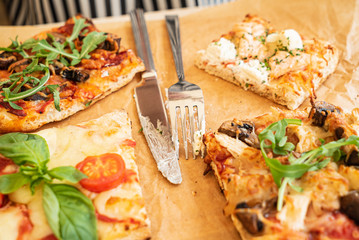 woman eating pizza in the restaurant