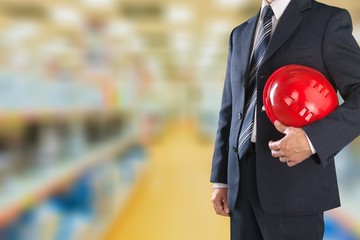 Worker man with helmet on background