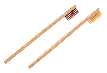 Wooden toothbrushes on a white background. Bamboo toothbrush.