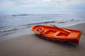 Lifeboat on a beach in Swinoujscie city on the Baltic Sea coast in West Pomerania region of Poland