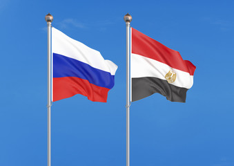 Naklejka na ściany i meble Russia vs Egypt. Thick colored silky flags of Russia and Egypt. 3D illustration on sky background. – Illustration