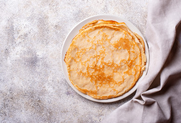 Pancakes crepes on light background