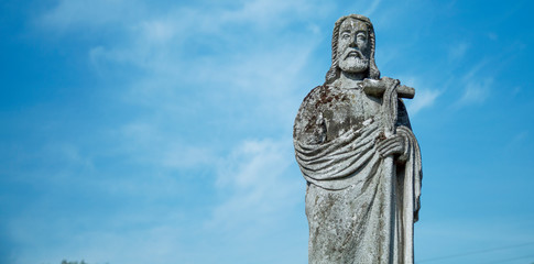 Ancient statue of Jesus Christ Good Shepherd. (Biblical tradition, religion, Christianity, God, faith concept)