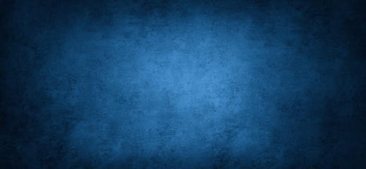 Wide blue textured concrete wall background