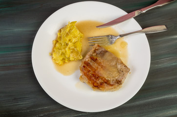 Grilled Pork Chop with Apple Sauce and Potatoes