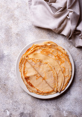 Pancakes crepes on light background