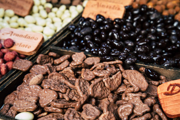 Different sorted chocolate candies on store